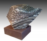 DIVISANDO ITACA (Spotting Ithaca)  by Juan Ramon Gimeno -  (2009) Ceramic: 27.3/16” x 17.3/4” x 13” Iron base 15.3/8” x 13” x 5.1/2” total height 23.5/8”  